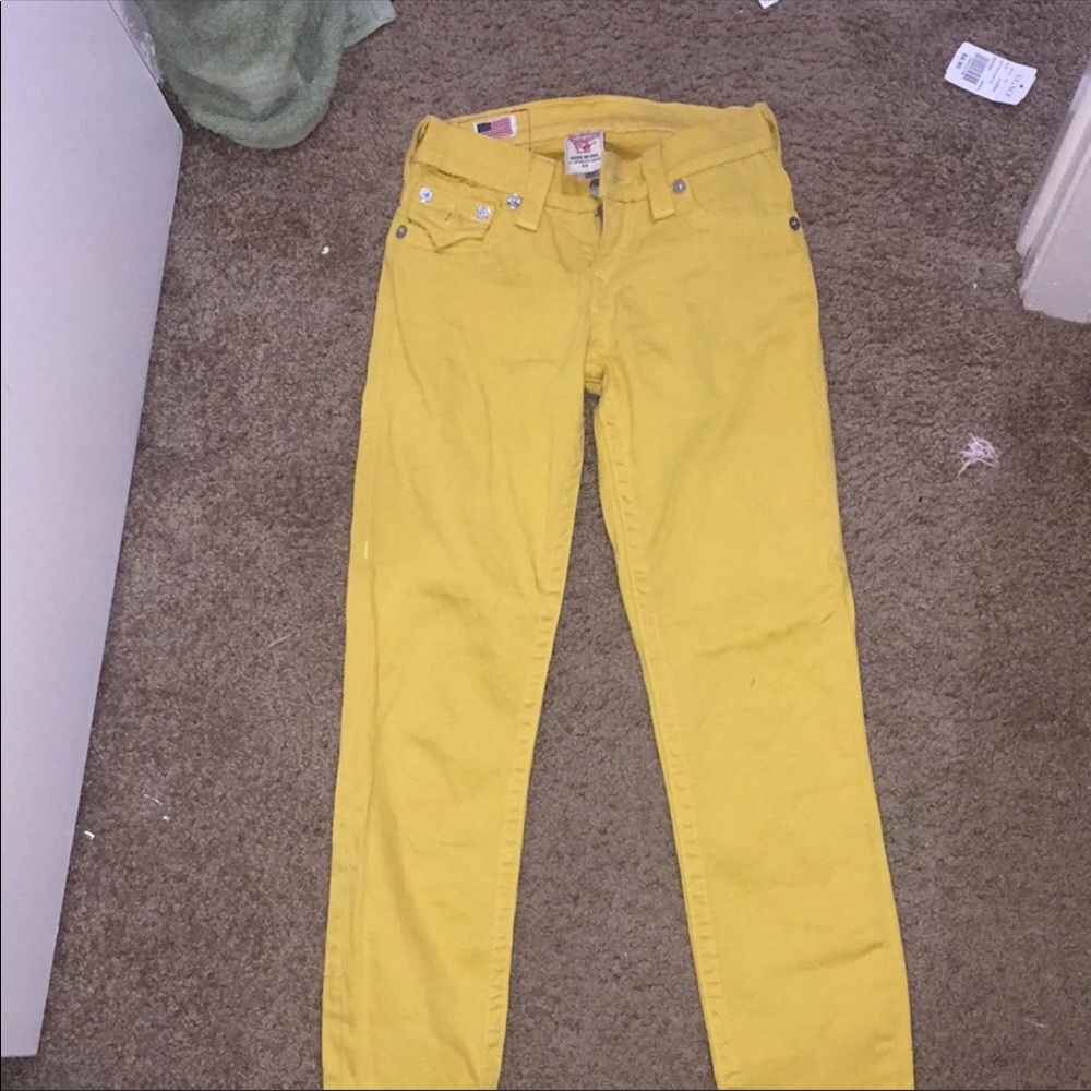 Yellow true religion skinny jeans